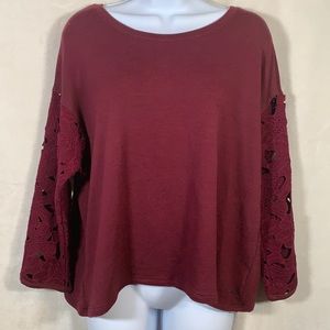 A.E.  sweater with open back and floral sleeves M